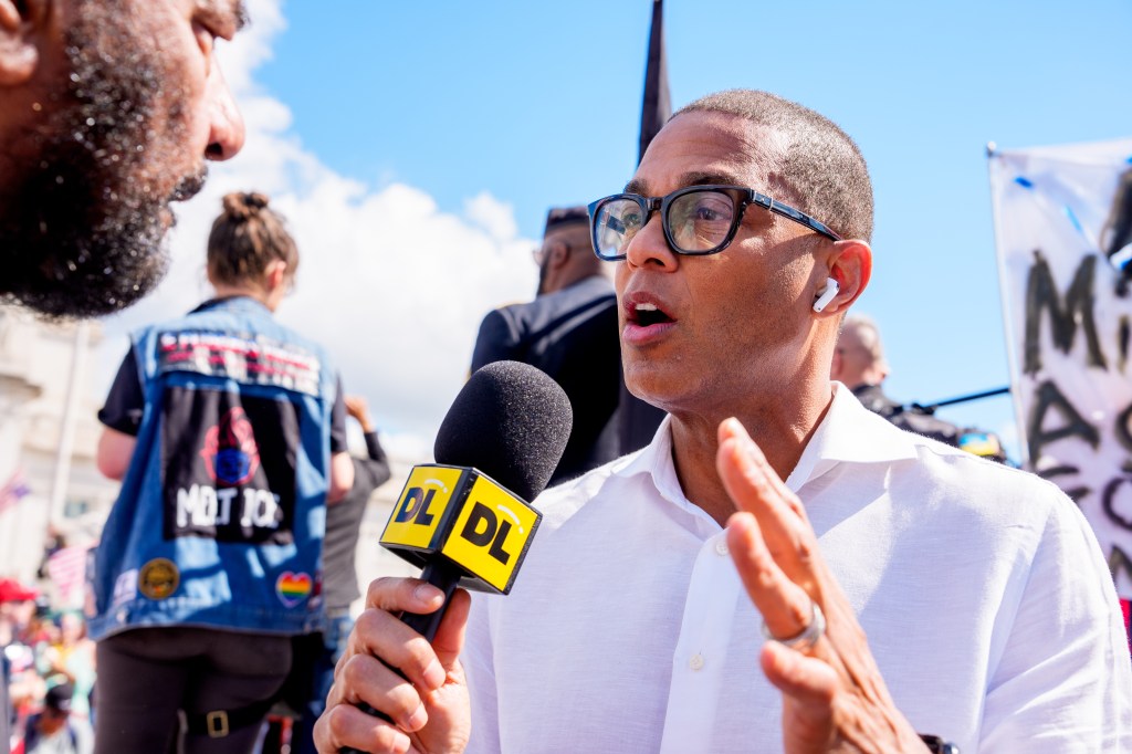 Don Lemon interviewing a man in a protest at Capitol Hill.