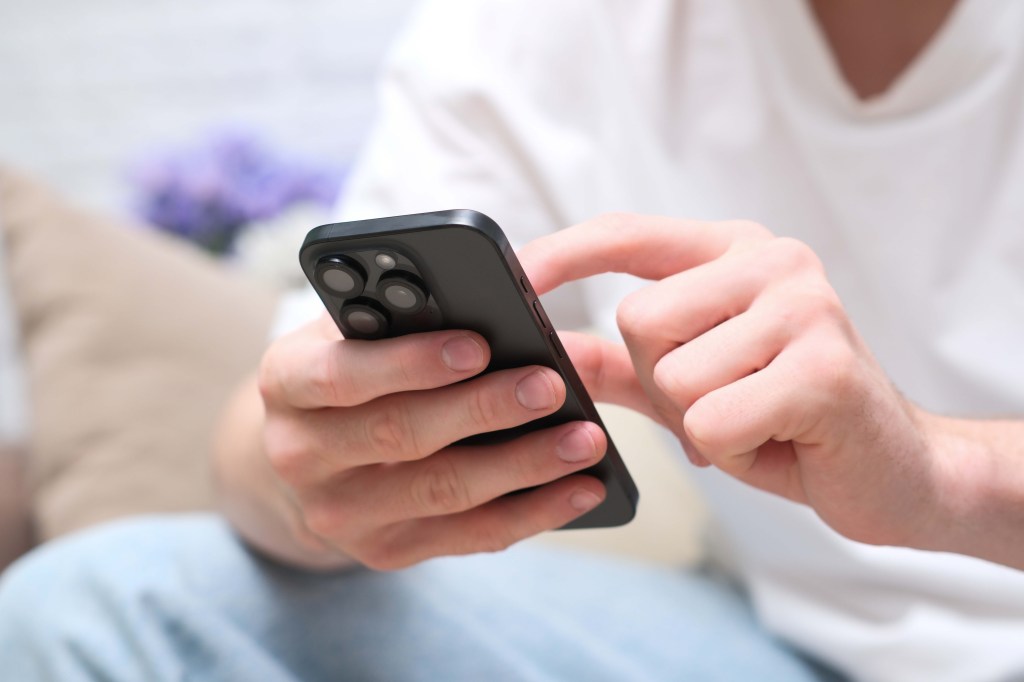 Closing a person using a smartphone.